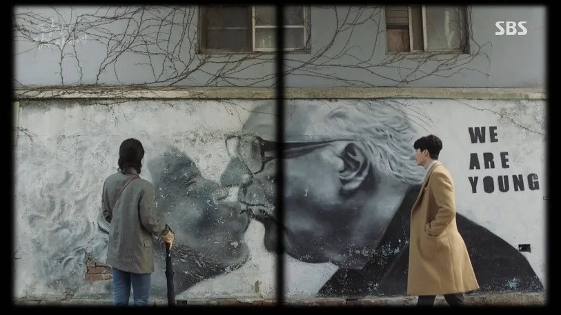 Nam Hong-joo and Jung Jae-chan at the WE ARE YOUNG mural in While You Were Sleeping