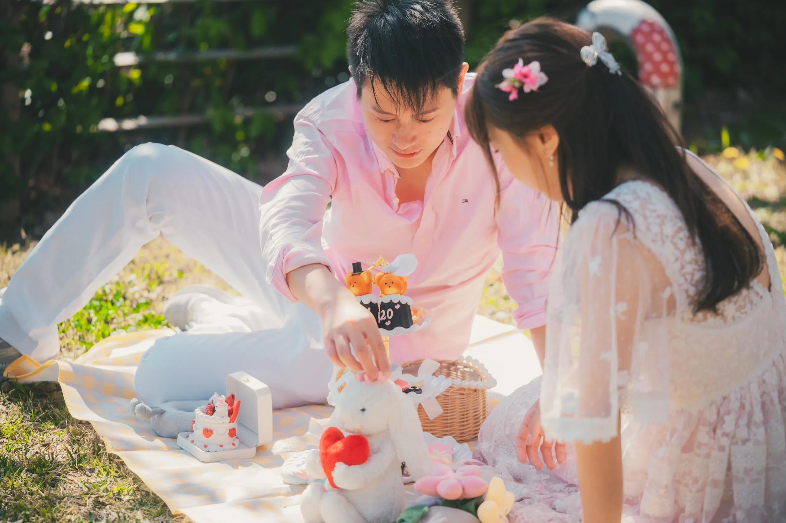 A blossom picnic, feeding each other, plushies laid on the blanket