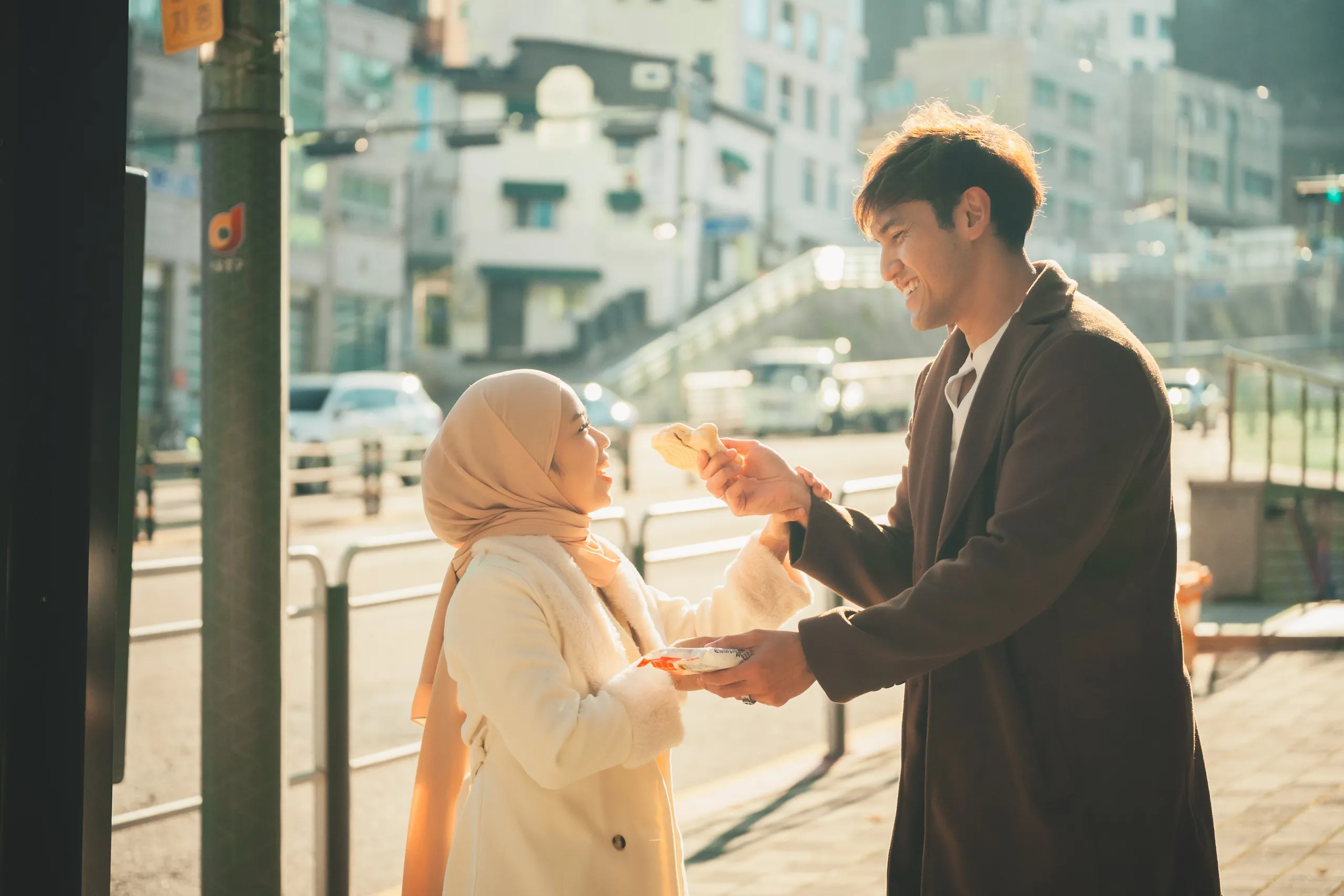 Adila and her partner in Seoul
