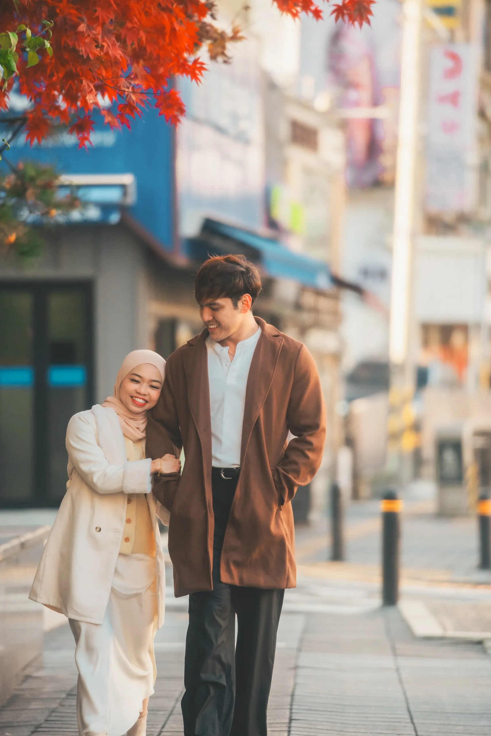 Adila and her partner in Seoul