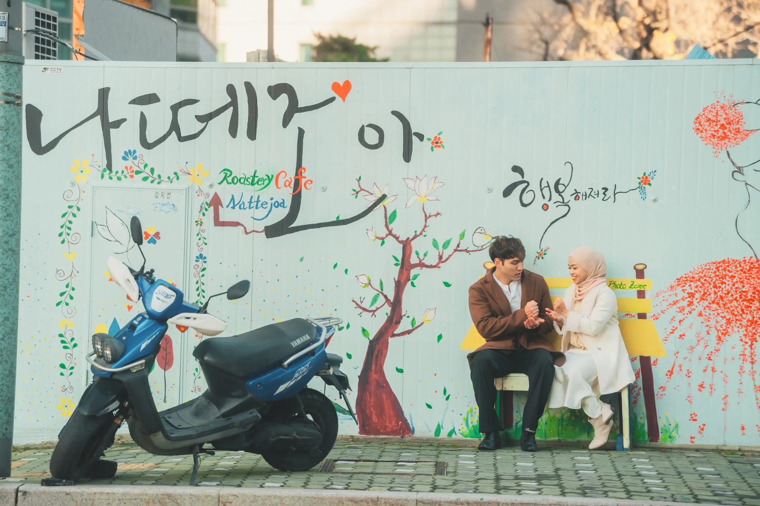 Adila and her partner in Seoul