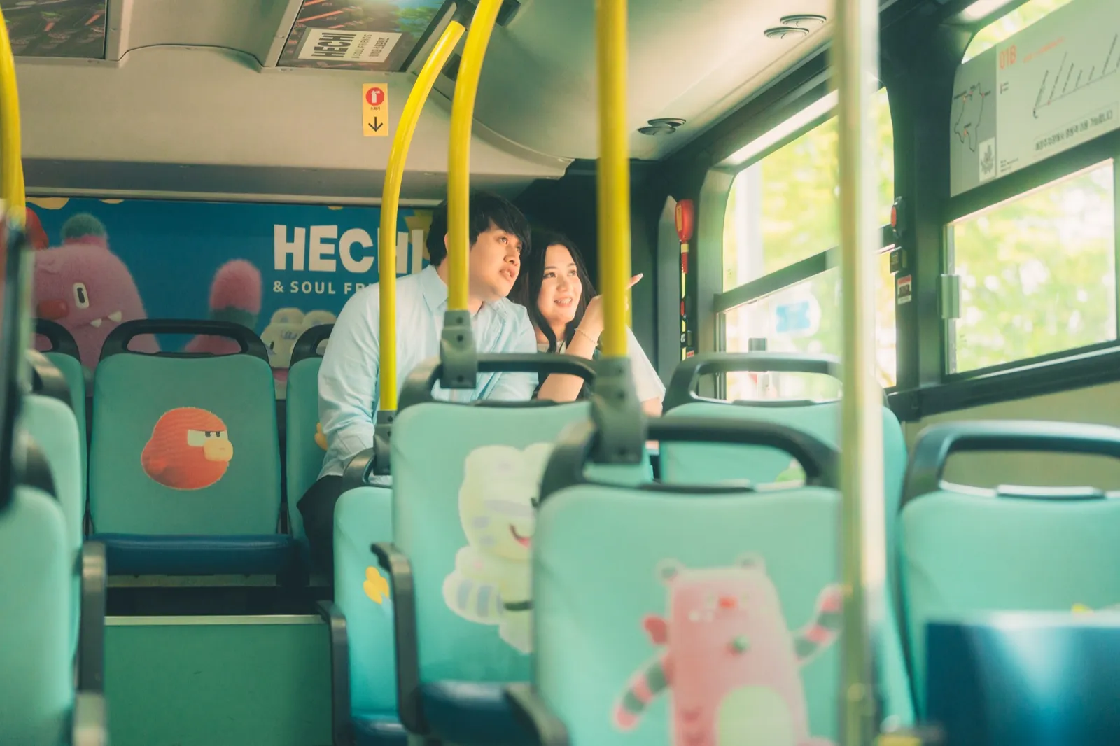 Ariel and Chay riding a Seoul city bus together